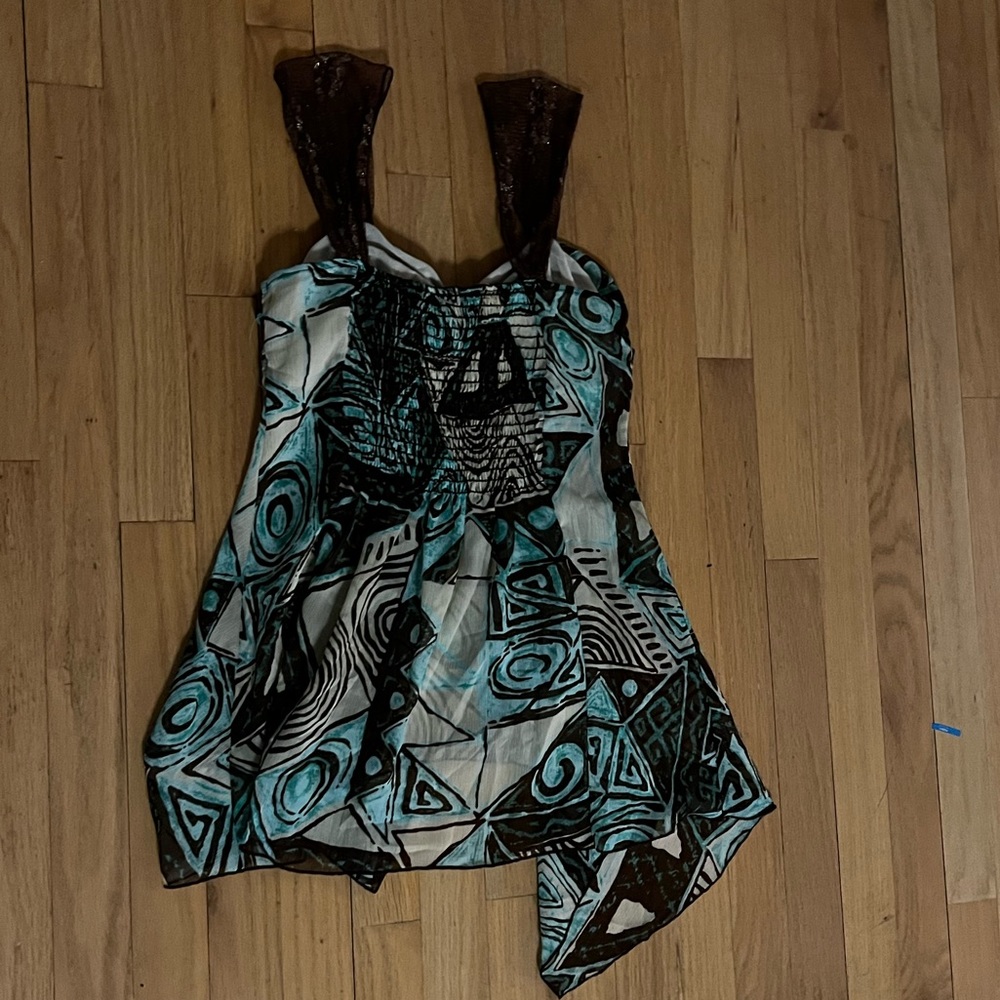 It’s Springy Sleeveness Top